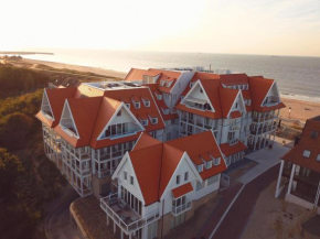 Familie beachhuis op de duinen (Duinhuis)